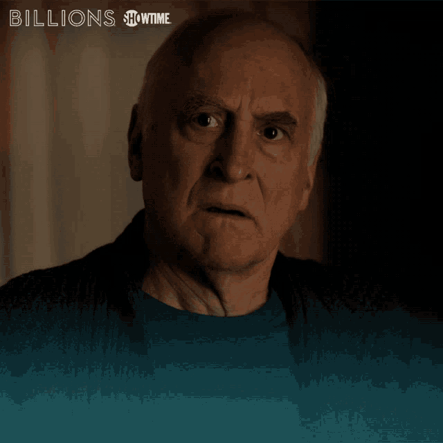 an ad for billions showtime shows an older man in a dark room