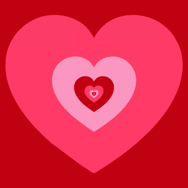 a pink heart with red hearts in it