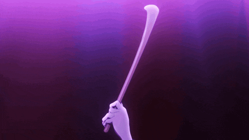 a purple background with a hand holding a stick