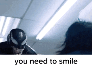 a picture of venom and a woman with the words you need to smile on the bottom