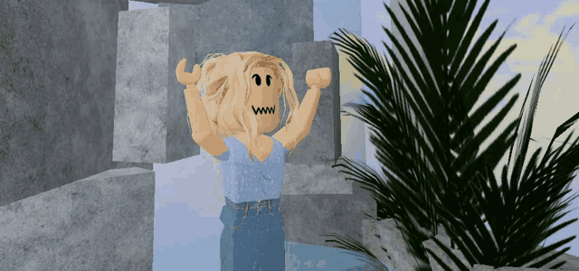 a girl in a blue top and jeans stands in front of a palm tree
