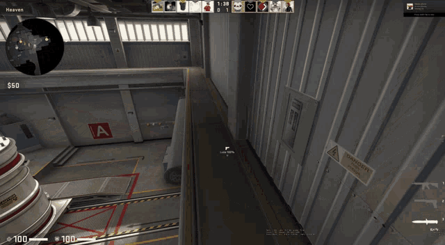 a person is holding a knife in a video game with a red a on the wall