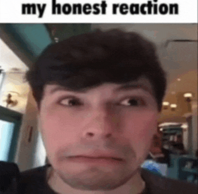a close up of a man 's face with the words `` my honest reaction '' above him .