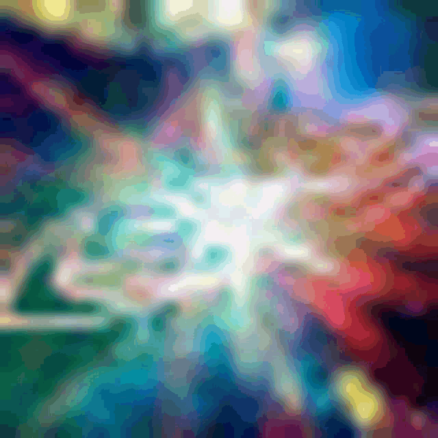 a blurred image of a colorful background with a star in the middle .