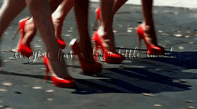 a group of women wearing red high heels are walking down a street with the words everyone has a dirty little secret behind them