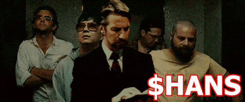 a group of men are standing next to each other with the word shans in red