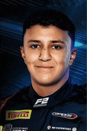 a young man wearing a racing suit with the letters f2 on the front