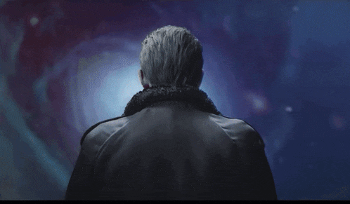 a man in a black jacket is holding a white object in the air with the words " and i will come back for you my love "