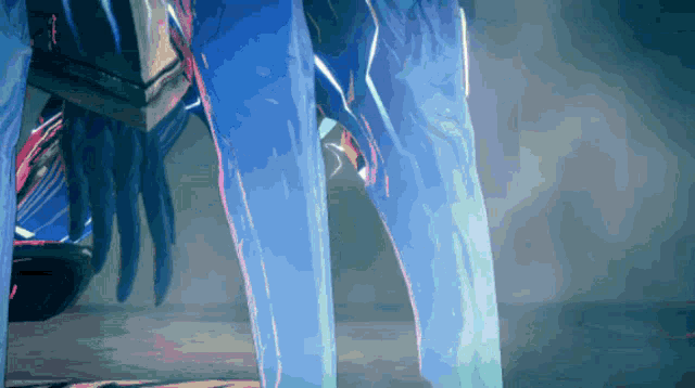 a close up of a person 's legs with a blue light coming out of them