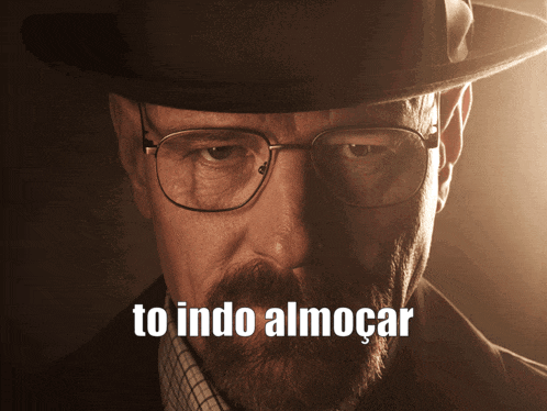 a man wearing glasses and a hat with the words to indo almocar written below him