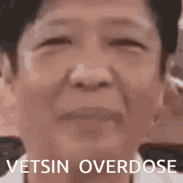 a close up of a person 's face with the words vetsin overdose written on the bottom
