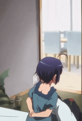 a girl in a blue dress stands in front of a window