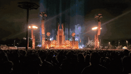 a crowd of people watching a concert with a stage that says ' l.a. ' on it