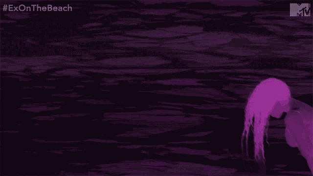 a silhouette of a woman in the water with the hashtag exonthe beach on the bottom