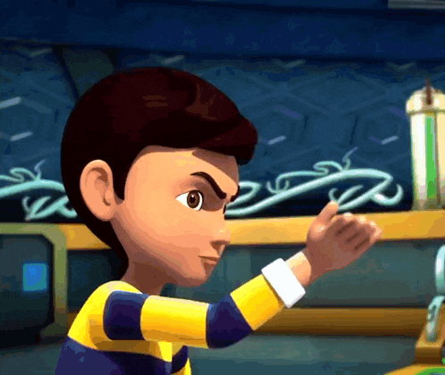 a boy in a yellow and blue striped shirt is standing in a room with his fist in the air