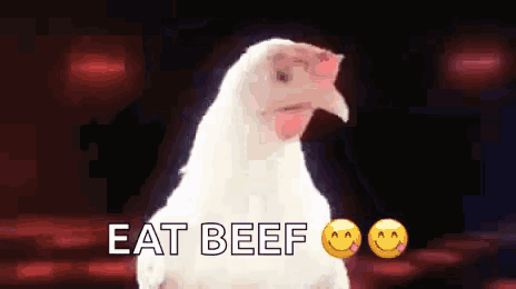 a white chicken says eat beef with two smiley faces next to it