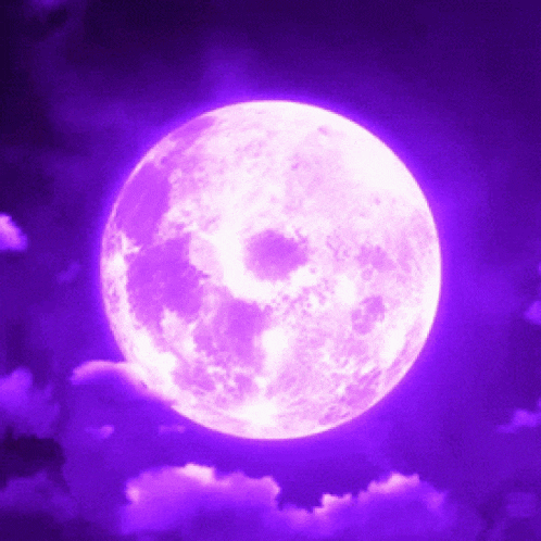 a purple full moon is shining brightly in the night sky