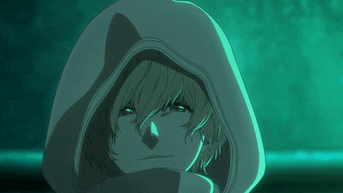 a close up of a person with a hood on