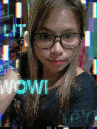 a girl wearing glasses and a black shirt with the word wow behind her