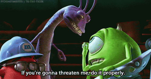 mike wazowski from monsters inc talking to a purple monster