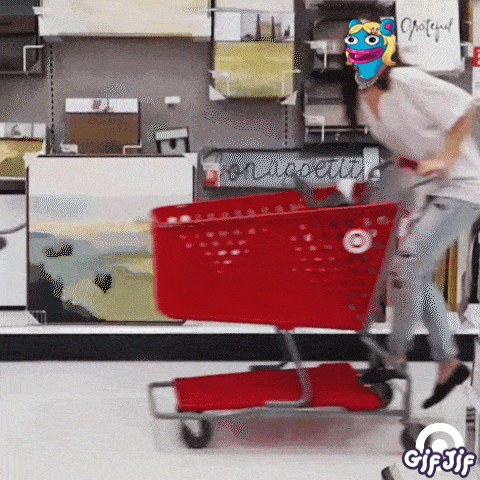 a woman is pushing a red shopping cart in a store with a sign that says " on appetite "