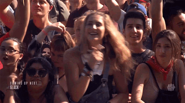 a crowd of people at a concert with the words growing up next black written on the bottom