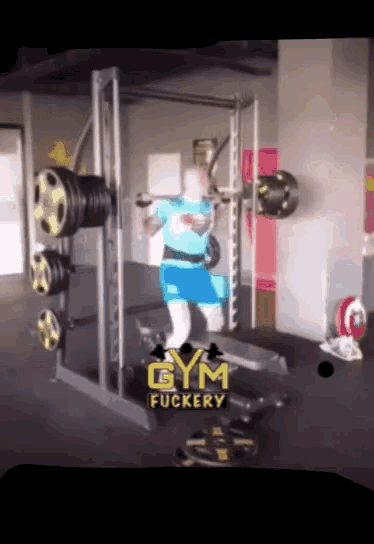 a man is squatting in a gym with the words gym fuckery behind him