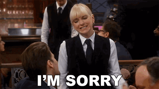 a waitress says i 'm sorry while talking to a man