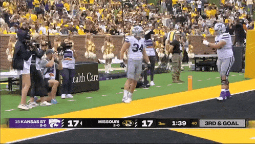 a football game between kansas st and missouri is being played