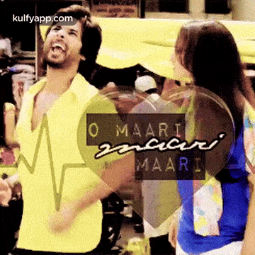 a man in a yellow shirt and a woman in a blue shirt are dancing in front of a heartbeat monitor .