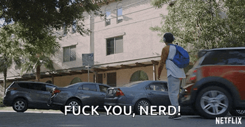 a man with a backpack is standing in front of a row of cars and says " fuck you nerd "