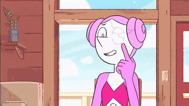 a cartoon character with a pink pearl on her head is sitting in front of a window and pointing at her face .