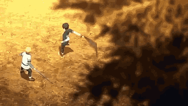 a man is holding a sword while another man is holding a sword .