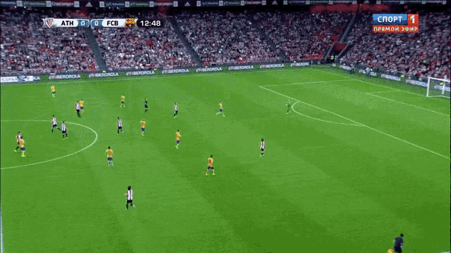 a soccer game between atm and fcb is being shown on tv