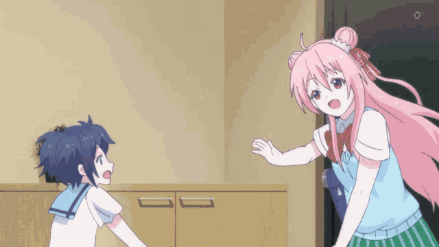 a girl with pink hair is hugging another girl in a room