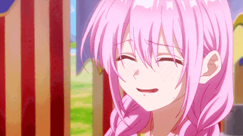 a close up of a girl with pink hair
