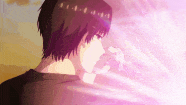 a close up of a person 's face with a pink light behind him
