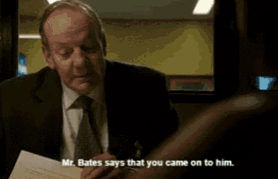 a man in a suit and tie is talking to another man and says that you came on to him