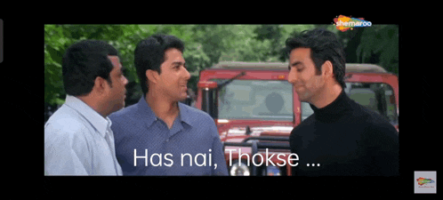 three men are standing next to each other and one of them is saying has nai thokse ...