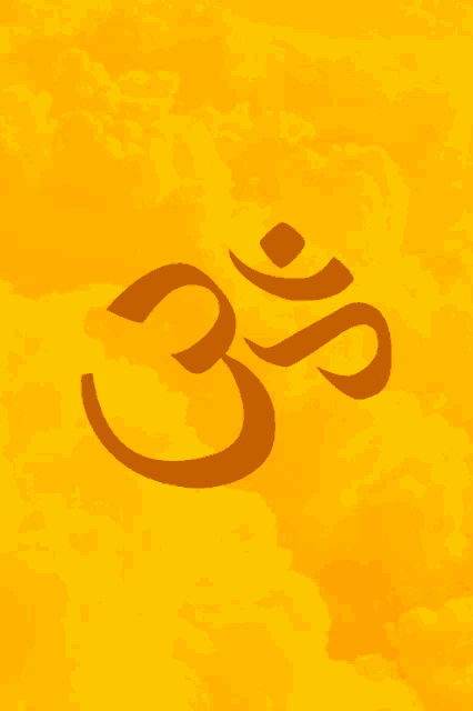 a yellow background with a brown om symbol in the middle