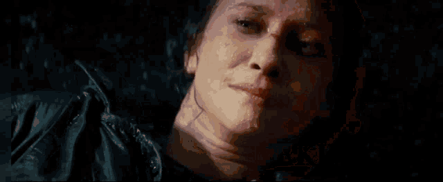 a close up of a woman with the words longlive the king written above her