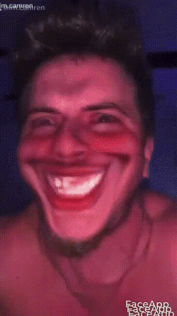 a close up of a person 's face with face app written on the bottom left
