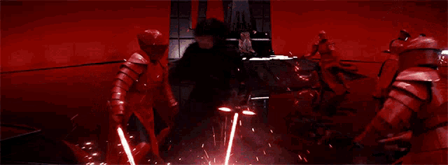a man in armor is holding a lightsaber in front of a group of soldiers