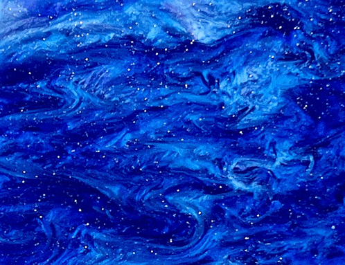 a close up of a blue painting with stars in it