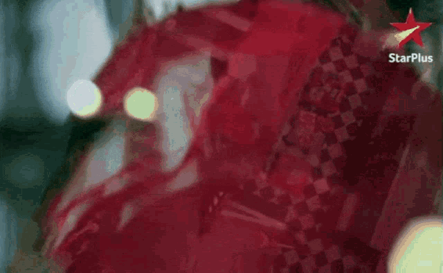 a star plus logo can be seen on a blurred background
