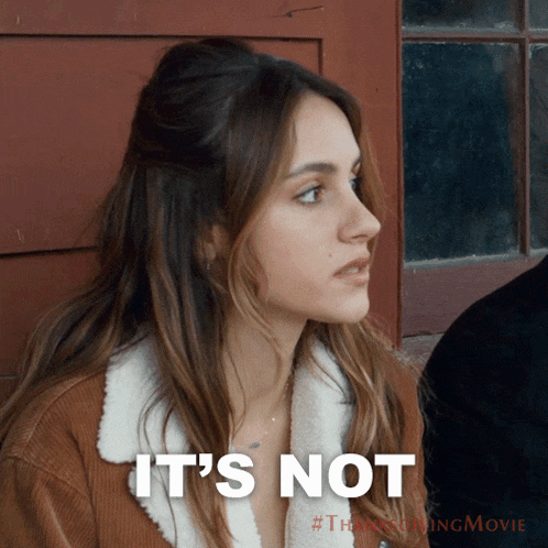 a woman says it 's not in front of a red building
