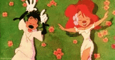 a cartoon of goofy and a woman dancing in the grass .