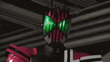 a kamen rider build card is being held by a person