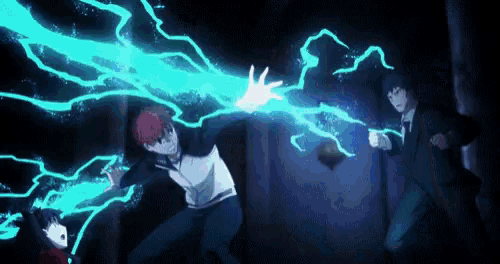a group of people are standing next to each other in a dark room with a blue lightning bolt coming out of their hands .