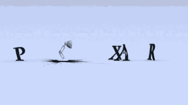 a lamp is laying on the ground with the letter p behind it